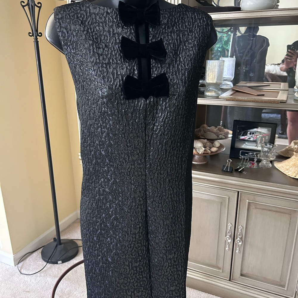 Elegant Black Textured Dress with Bow Accents